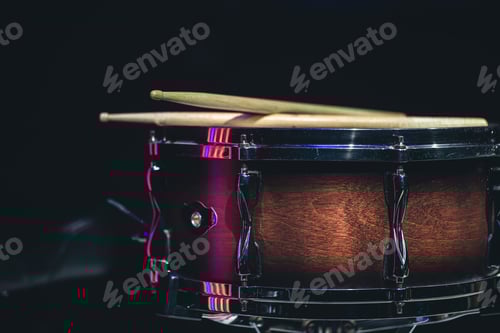 Preview: Close-up, snare drum on a dark background isolated, copy space.