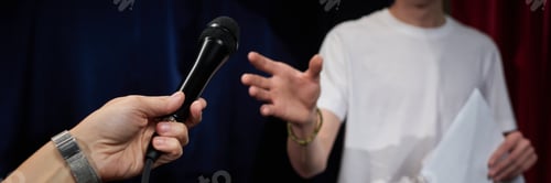 Preview: Handing Over Microphone During Presentation Event