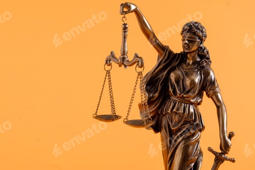 Preview: Figure of justice holding scales over orange