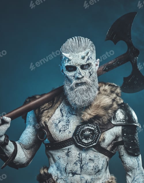 Preview: Mythical winter warrior with huge axe on his shoulder in fog