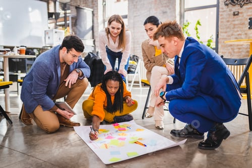 Preview: Business team working in a start-up office