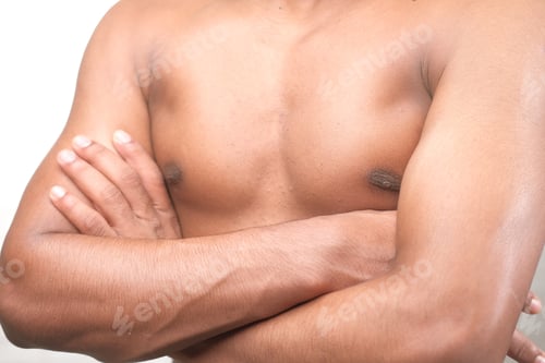 Preview: young man with arm crossed showing his chest
