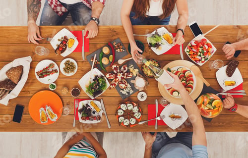 Preview: People eat meals drink alcohol at festive table dinner party