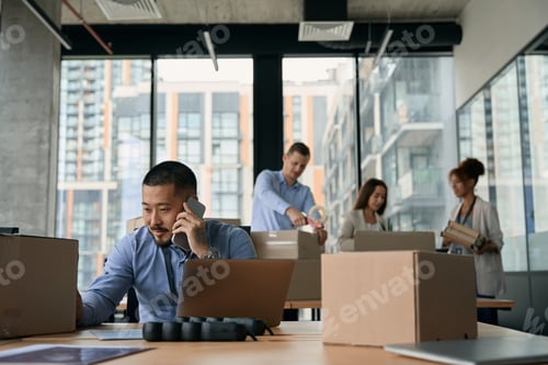 Preview: Group of company workers preparing for office relocation