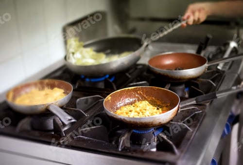 Preview: Italian pasta and sauces cooking on a burner