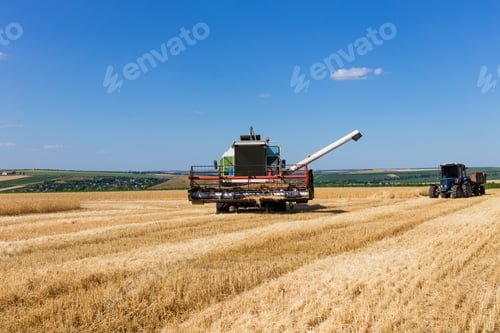 Preview: Combine harvester working on a wheat field.