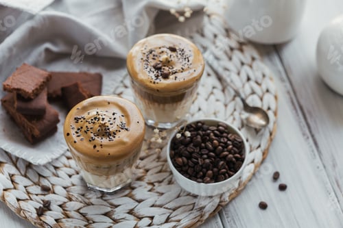 Preview: Cocktail with coffee, milk and ice cubes on white background mockup