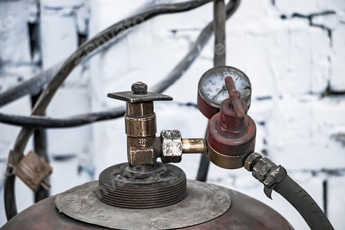 Preview: Old gas cylinders for welding and cutting. Rusty propane and oxy