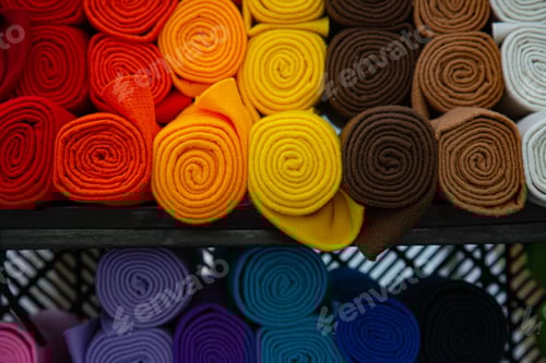 Preview: Colorful Fabric Rolls in Spiral Patterns
