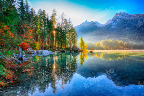 Preview: Fantastic autumn sunny day on Hintersee lake. Beautiful scene of mirror reflection in water