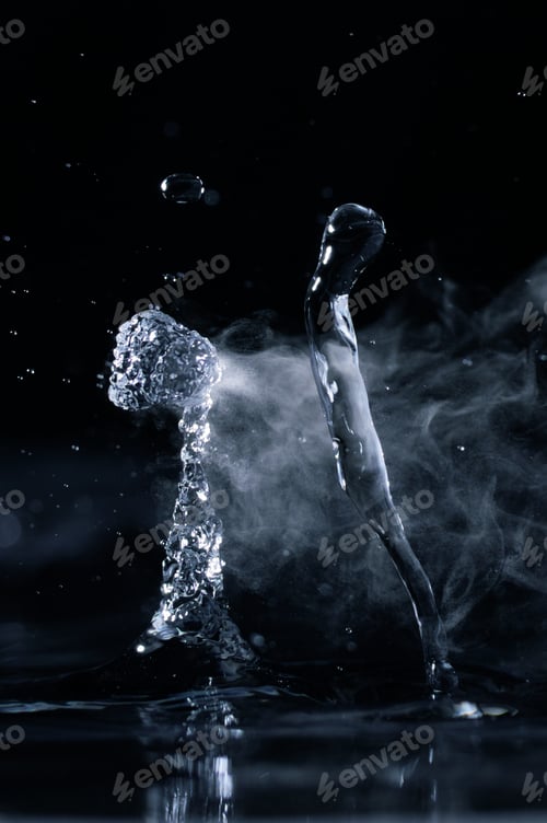 Preview: Boiling water splash with steam on black background closeup