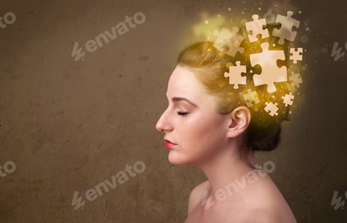 Preview: Young Person Thinking With Glowing Puzzle Mind On Grungy Background