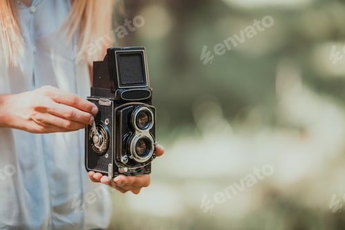 Preview: Woman taking photos