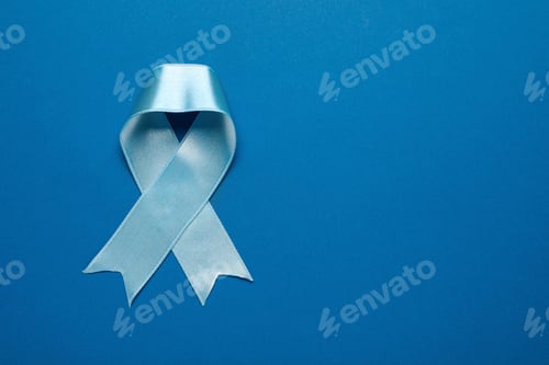 Preview: Light blue awareness ribbon on color background, top view. Space for text