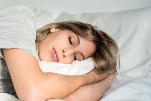 Preview: beautiful young women sleeping in bed