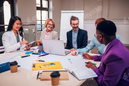Preview: Multiracial business group of people having a meeting in an office