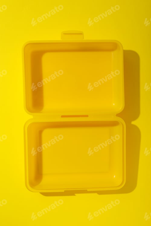 Preview: Bright Yellow Lunchbox Container on Matching Background