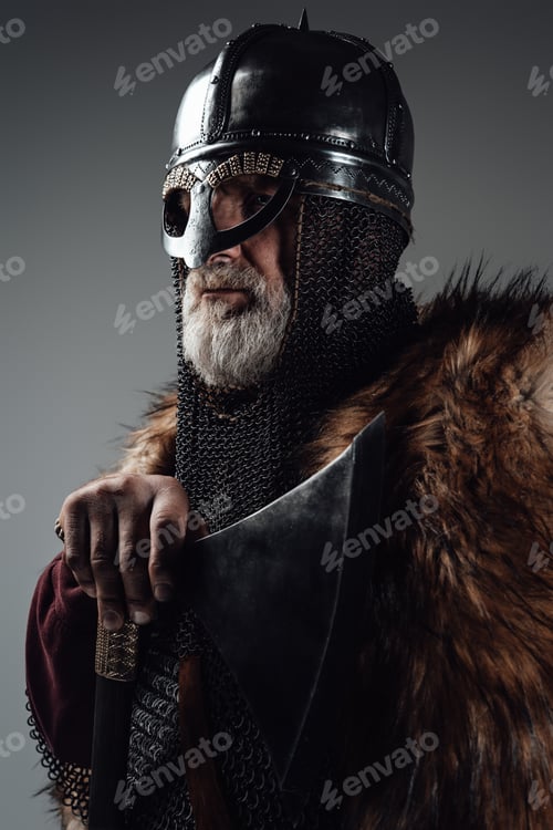 Preview: Side view studio shot of old man viking with axe
