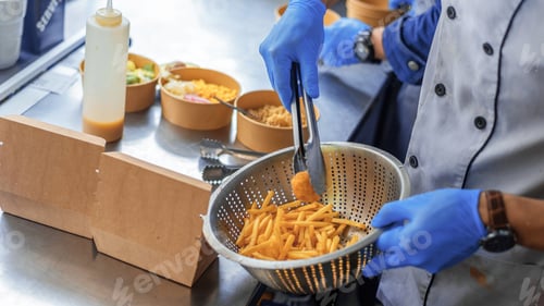 Preview: Cook working in a food truck