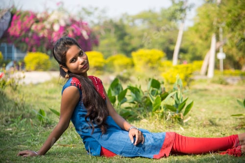 Preview: Outdoor portrait of beautiful young Indian girl in the park