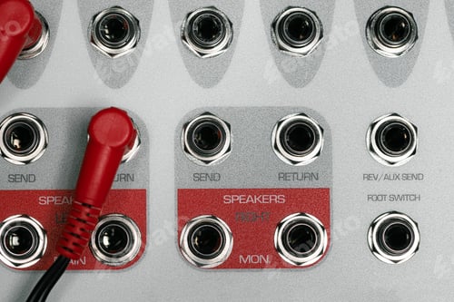 Preview: Rear panel of music system amplifier with wires