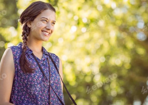 Preview: Pretty hipster smiling on a summers day