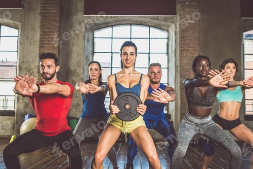 Preview: Athletes training in a gym