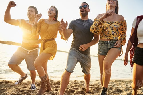 Preview: Group of young people outdoors at sunset