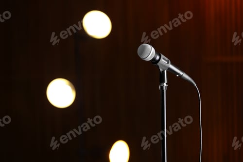 Preview: Microphone against festive lights, space for text