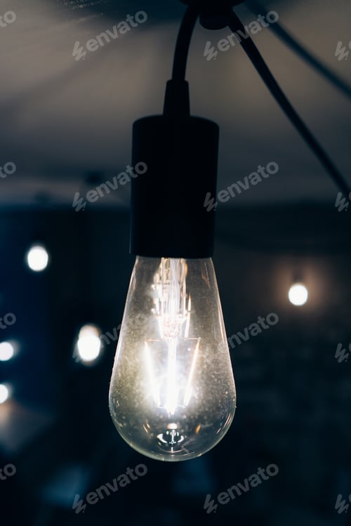 Preview: Glowing Lightbulb Creates a Moody Atmosphere