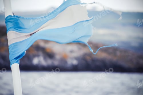 Preview: Argentine flag fluttering in the wind on a vessel in the Beagle Channel