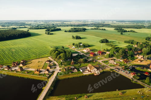 Preview: view from the height of the Lake in a green field in the form of a horseshoe and a village in the