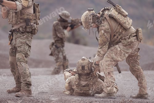 Preview: Soldiers in camouflage military uniforms carrying weapons Reconnaissance missions in rugged mountain