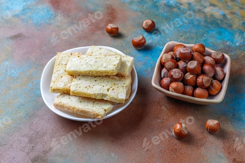 Preview: Slices of dry bread with hazelnuts.