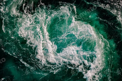 Preview: Blue waves of water of the river and the sea meet each other during high tide and low tide.