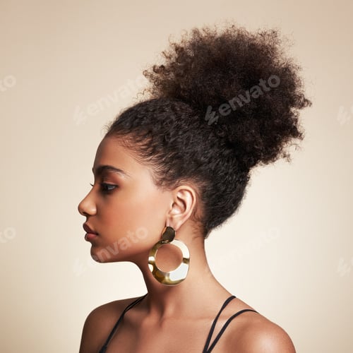 Preview: Stylish Woman Wearing Gold Earrings in Profile