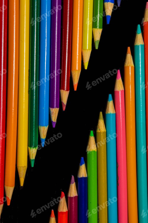 Preview: Color pencils against a black background.