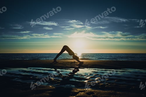 Preview: Woman Doing Yoga on Beach at Sunset