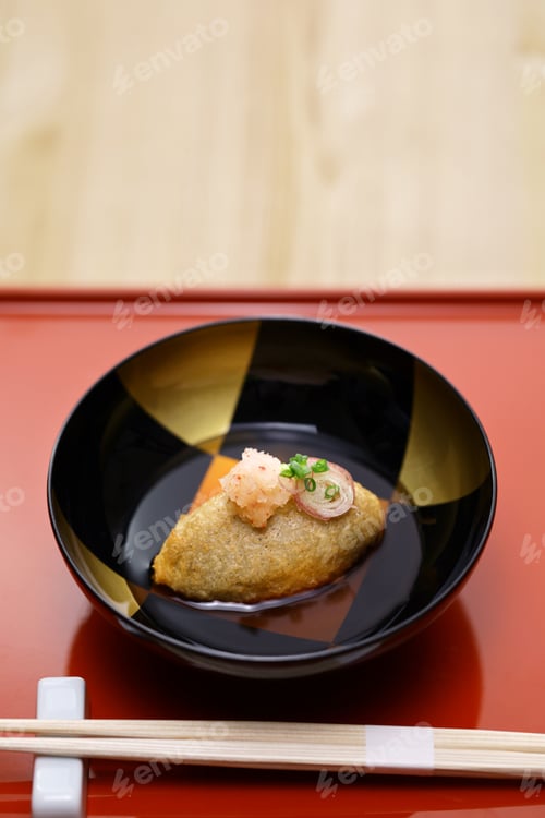 Preview: crispy fried buckwheat dumpling with dashi-based sauce. Japanese soba cuisine