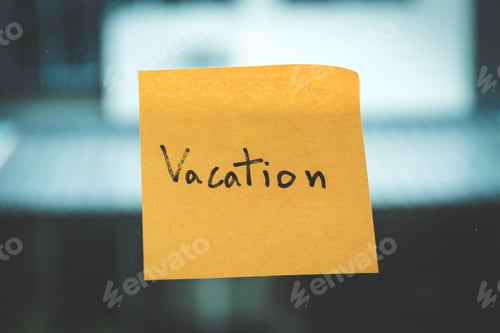 Preview: yellow paper of note book with window glass written Vacation.