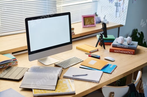 Preview: Workplace with computer monitor and books