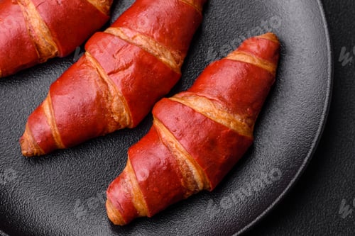 Preview: Delicious sweet crunchy red croissant with cream filling