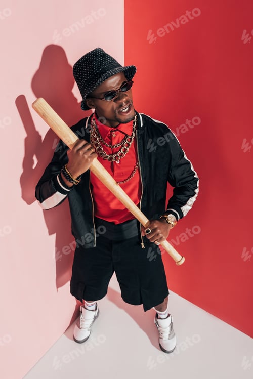 Preview: high angle view of aggressive african american man holding baseball bat