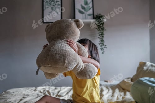 Preview: Cute little kid with teddy bear