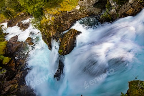 Preview: View of the river Geirangerelvi and the waterfall Storfossen in Geiranger, Norway.
