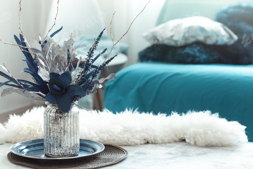 Preview: Still life vase with artificial flowers in the living room.