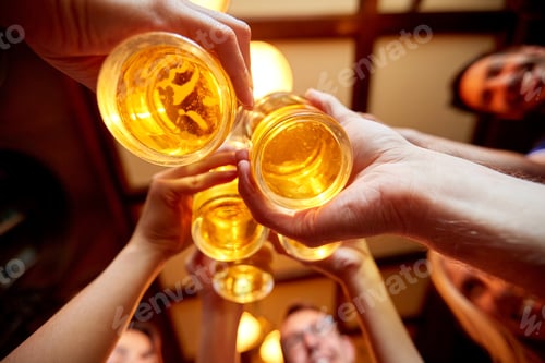 Preview: friends clinking beer glasses at pub or bar