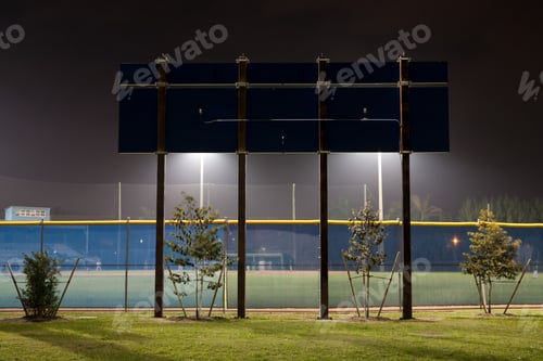 Preview: Stadium scoreboard illuminated sportsground at night