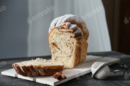 Preview: artisan cinnamon swirl bread on wooden rack