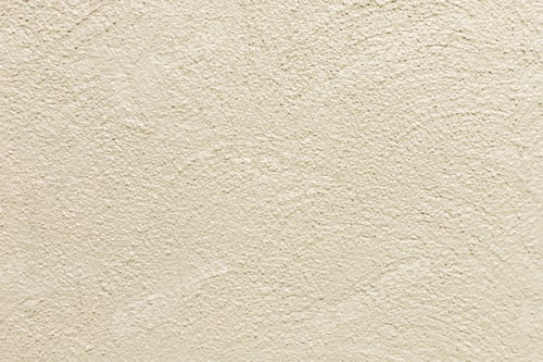 Preview: Beige painted stone wall background, abstract texture